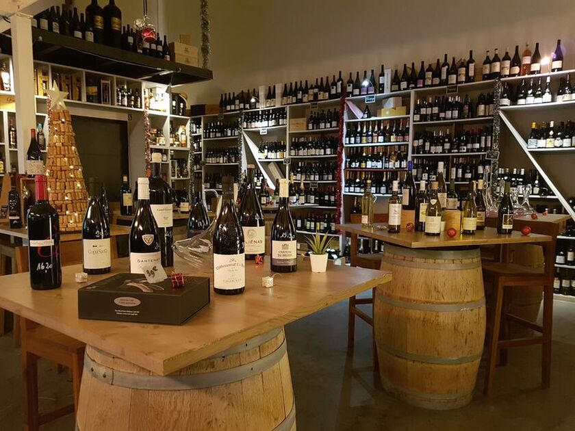 © Plaisirs Divins - Restaurant § Cave à vins Plaisirs Divins