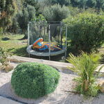 © Jardin avec trampoline - Gresle Olivier